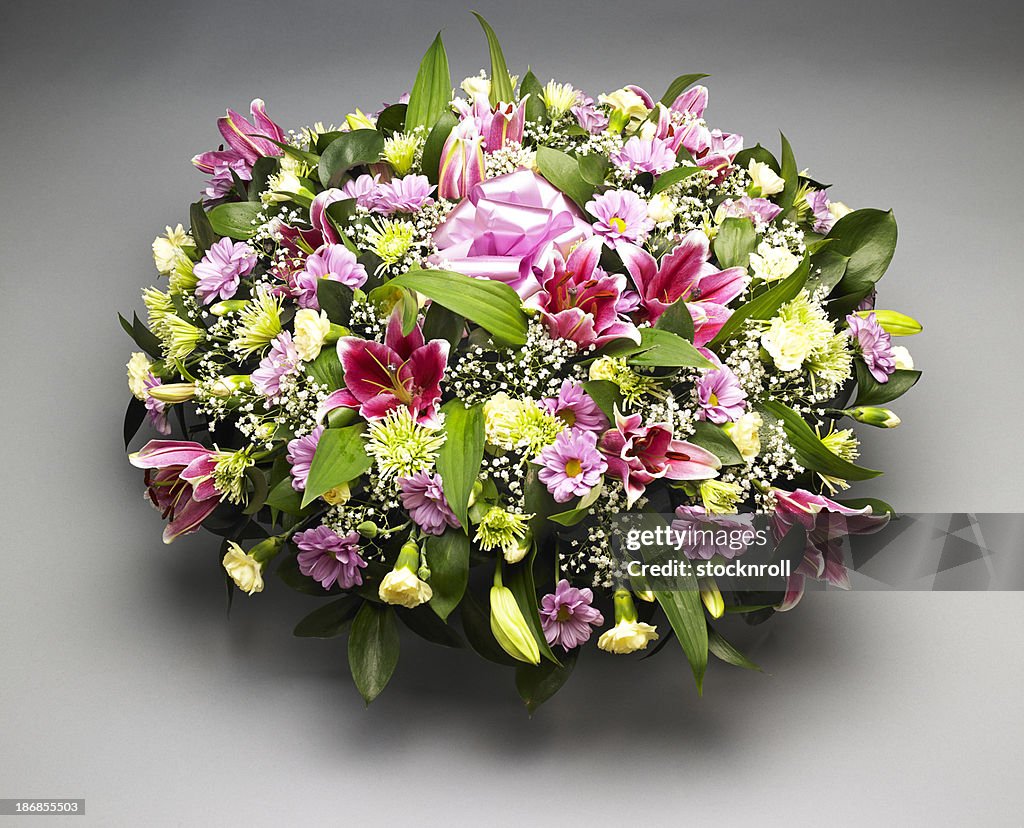 Funeral flower arrangement. Studio shot.