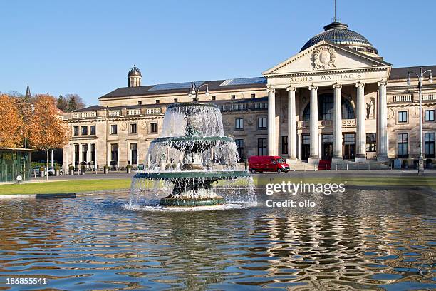 fountain in front of kurhaus wiesbaden - wiesbaden stock pictures, royalty-free photos & images