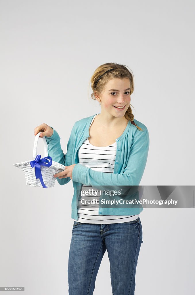 Teen Girl with White Wicker Basket