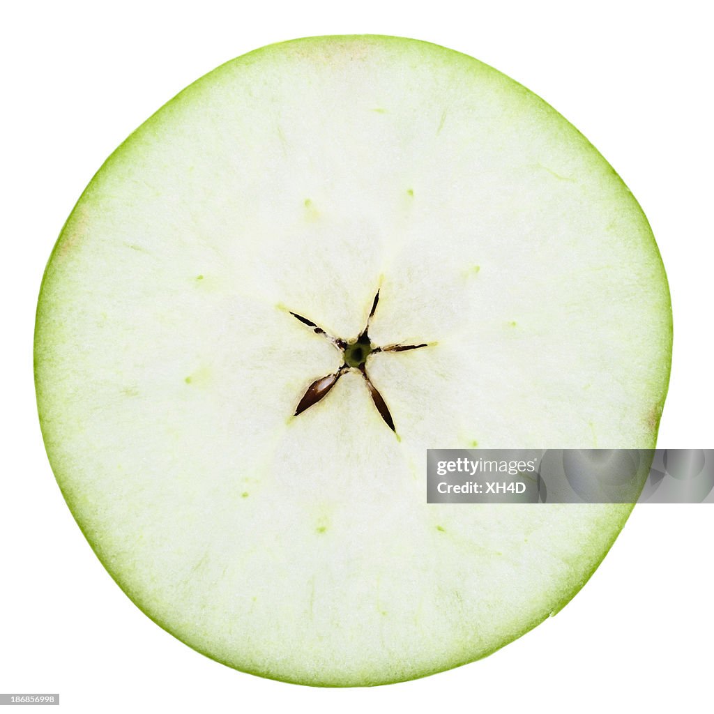 Una metà di mela verde