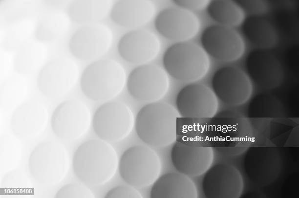 a close up shot of a golf ball, white and fade to dark gray - golfboll bildbanksfoton och bilder