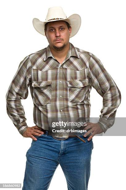 serious cowboy - arms akimbo stock pictures, royalty-free photos & images