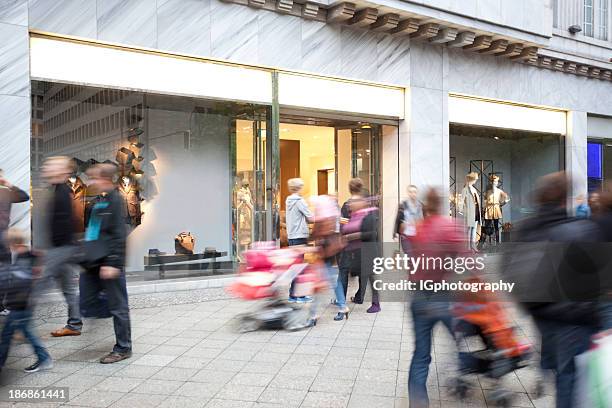 shopping crowd - clothing store stockfoto's en -beelden