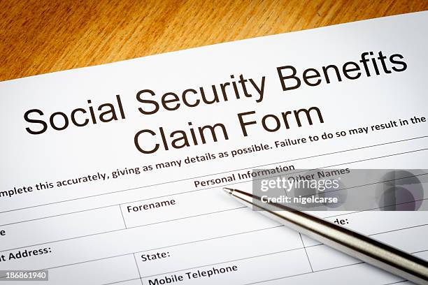 social security benefits claim form - social security stock pictures, royalty-free photos & images