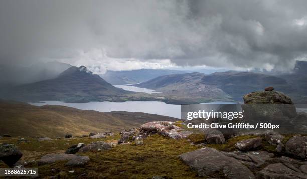 scenic view of mountains against sky - squall stock pictures, royalty-free photos & images