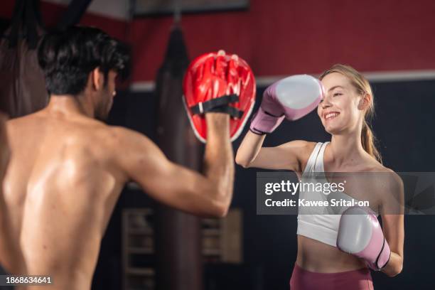 active sport athlete man and woman with six pack abs friend in sportswear greeting by give high five together before doing boxing workout exercise for health care and build muscle in fitness gym club. - asian six pack photos et images de collection