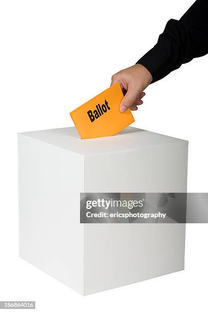 voting by a man - ticket election stock pictures, royalty-free photos & images