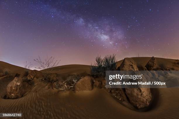 scenic view of desert against sky at night,fujairah,united arab emirates - fujairah bildbanksfoton och bilder