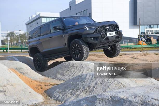 DongFeng MengShi M-Hero 917 electric off-road vehicle undergoes a test at Dongfeng M-hero Technology Smart Park on December 5, 2023 in Wuhan, Hubei...