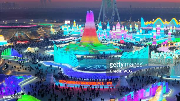 Aerial view of tourists visiting the 25th Harbin Ice and Snow World on December 18, 2023 in Harbin, Heilongjiang Province of China. The 25th Harbin...