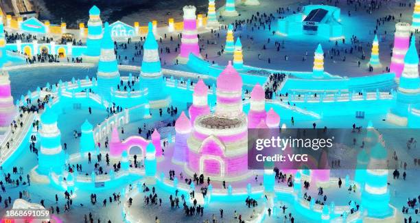 Aerial view of tourists visiting the 25th Harbin Ice and Snow World on December 18, 2023 in Harbin, Heilongjiang Province of China. The 25th Harbin...