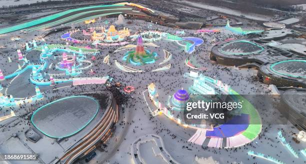 Aerial view of tourists visiting the 25th Harbin Ice and Snow World on December 18, 2023 in Harbin, Heilongjiang Province of China. The 25th Harbin...