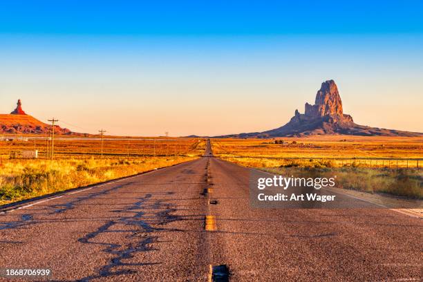 agathla peak arizona - crossing the road stock pictures, royalty-free photos & images