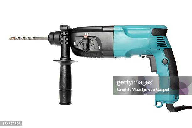 powertools-hammer drill - elektrisches werkzeug stock-fotos und bilder
