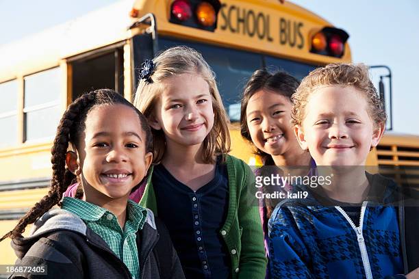 children standing outside school bus - native korean stock pictures, royalty-free photos & images