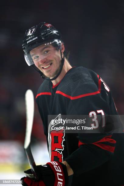 Andrei Svechnikov of the Carolina Hurricanes shares a smile during the third period of the game against the Vegas Golden Knights at PNC Arena on...