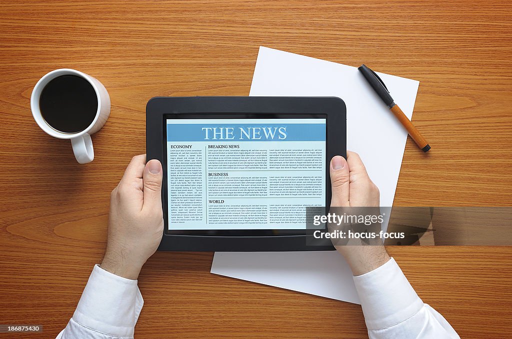 Reading news with tablet pc