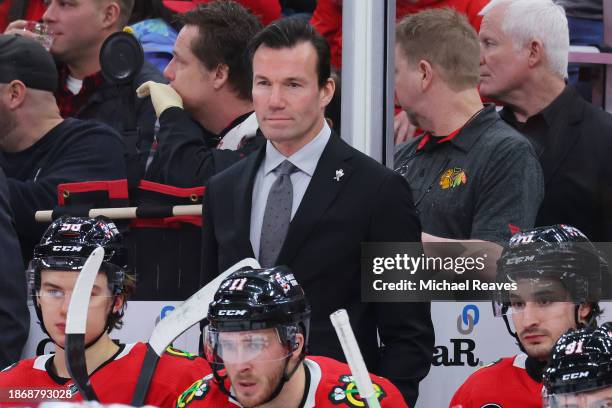 Head coach Luke Richardson of the Chicago Blackhawks looks on against the Colorado Avalanche during the second period at the United Center on...