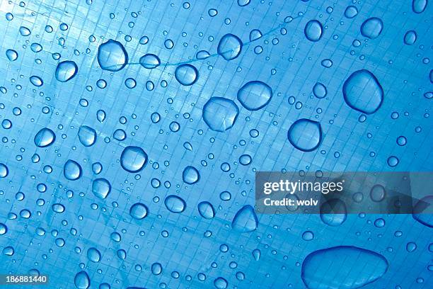 blue drops 2 - tarpaulin stock pictures, royalty-free photos & images