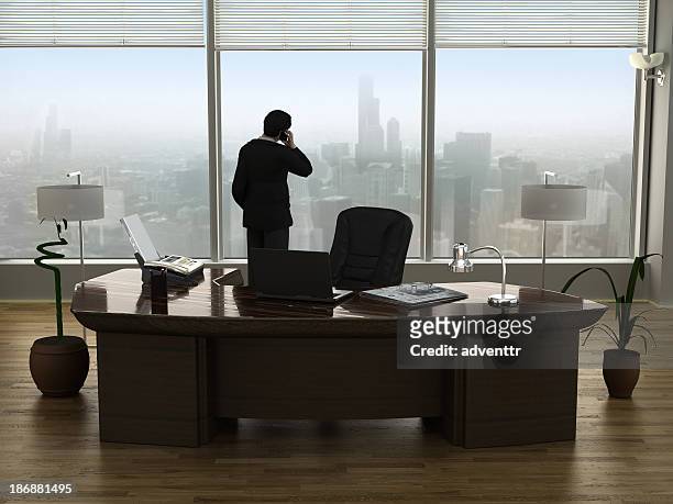 businessman talking on the phone - chief executive officer stock pictures, royalty-free photos & images
