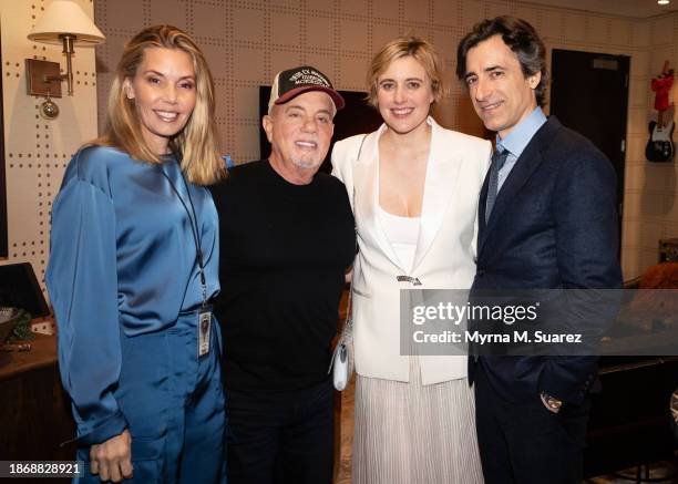 Alexis Roderick, Billy Joel, Greta Gerwig and Noah Baumbach seen backstage at Madison Square Garden on December 19, 2023 in New York City.