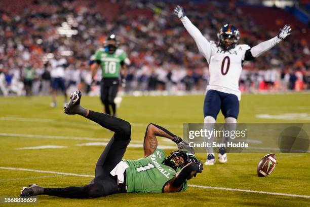 Talik Keaton of the Marshall Thundering Herd reacts after failing to catch a pass during the first half of the Frisco Bowl against the UTSA...