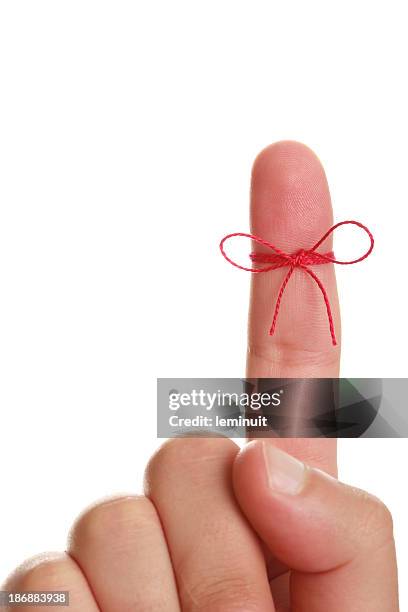 reminder - string tied to finger stock pictures, royalty-free photos & images