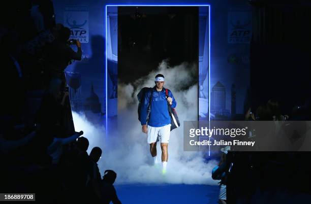 Juan Martin Del Potro of Argentina walks out for his men's singles match against Richard Gasquet of France during day one of the Barclays ATP World...
