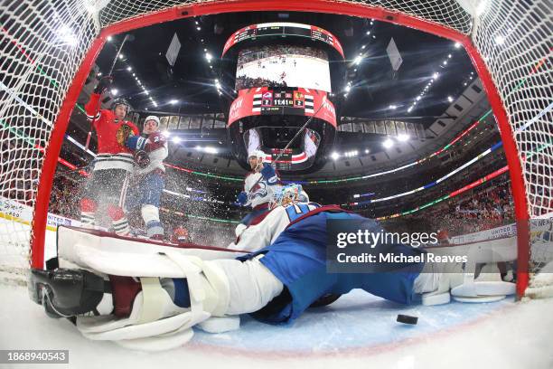 Tyler Johnson of the Chicago Blackhawks celebrates after scoring a goal past Alexandar Georgiev of the Colorado Avalanche during the third period at...