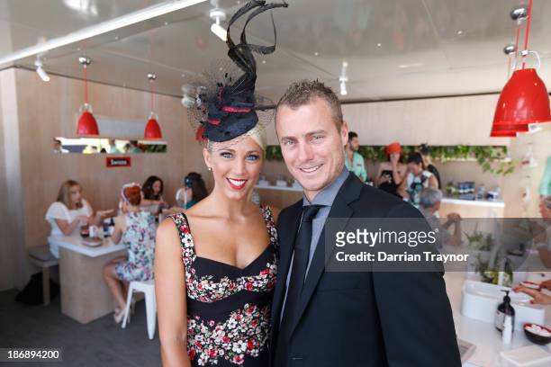 Tennis player Lleyton Hewitt and wife Bec Hewitt attend Melbourne Cup Day at Flemington Racecourse on November 5, 2013 in Melbourne, Australia.
