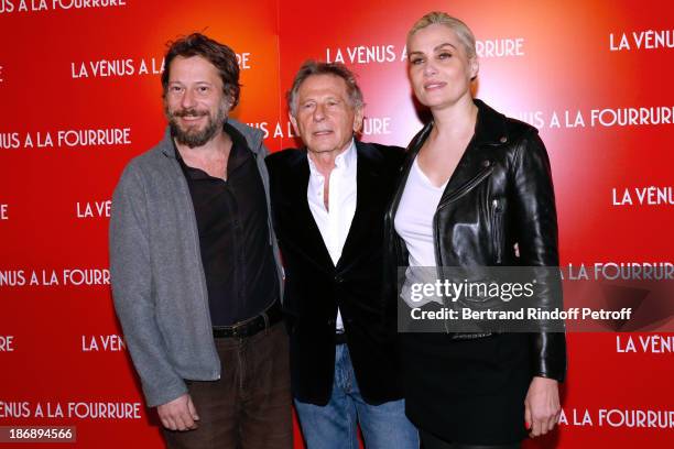 Director of the movie Roman Polanski stands between actors of the movie Mathieu Amalric and Emmanuelle Seigner attend 'La Venus a La Fourrure - Venus...