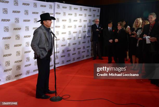 Musician George Strait speaks during a press conference at the 51st annual ASCAP Country Music Awards at Music City Center on November 4, 2013 in...