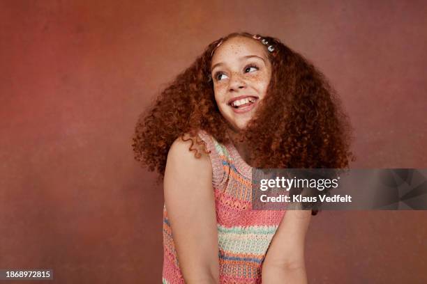 happy girl with freckle dancing in crochet top - budding tween stock pictures, royalty-free photos & images