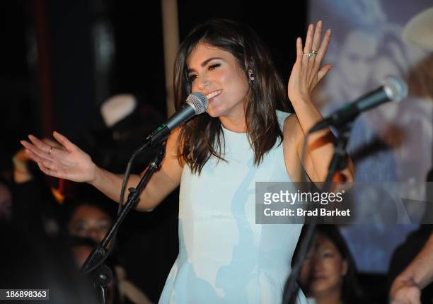 Actress Nikki Reed performs at the Twilight Forever Fan Experience Exhibit launch at Planet Hollywood Times Square on November 4, 2013 in New York...
