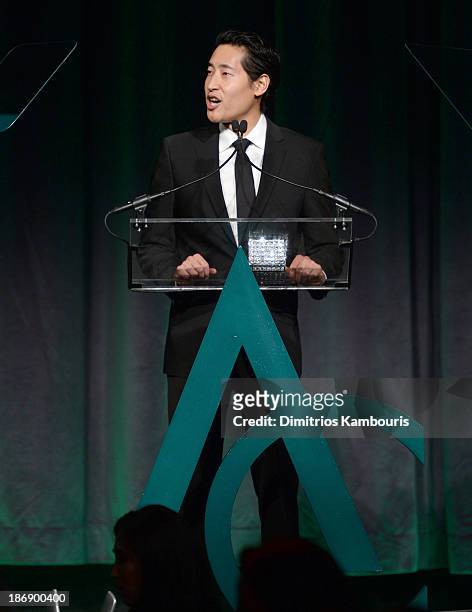 Charlie Chanaratsopon speaks onstage at the 17th Annual Accessories Council ACE Awards At Cipriani 42nd Street on November 4, 2013 in New York City.