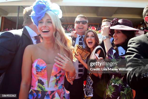 Tom Waterhouse, Kate Waterhouse, Hoda Waterhouse, and Luke Ricketson celebrate as the Gai Waterhouse trained horse Fiorente wins the Melbourne Cup...