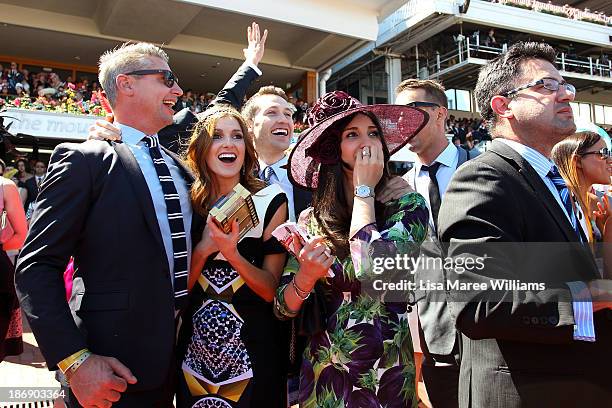 Tom Waterhouse, Kate Waterhouse, Hoda Waterhouse, and Luke Ricketson celebrate as the Gai Waterhouse trained horse Fiorente wins the Melbourne Cup...