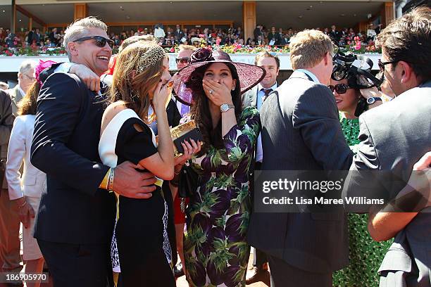 Tom Waterhouse, Kate Waterhouse, Hoda Waterhouse, and Luke Ricketson celebrate as the Gai Waterhouse trained horse Fiorente wins the Melbourne Cup...