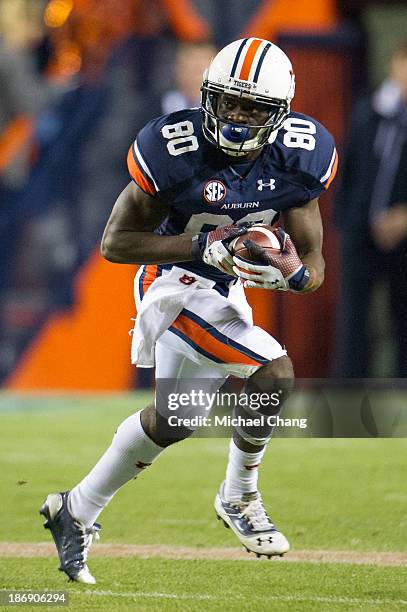 Wide receiver Marcus Davis of the Auburn Tigers runs the ball downfield during their game against the Florida Atlantic Owls on October 26, 2013 at...