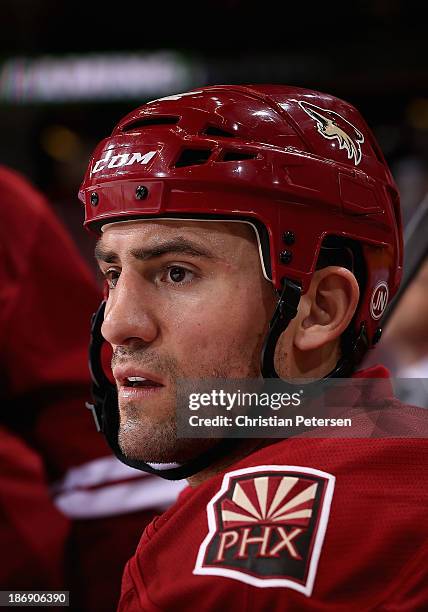 Paul Bissonnette of the Phoenix Coyotes watches from the bench during the NHL game against the Nashville Predators at Jobing.com Arena on October 31,...