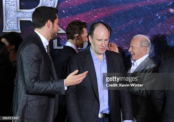 Actor Zachary Levi, President of Production at Marvel Studios Kevin Feige and actor Anthony Hopkins arrive at the premiere of Marvel's "Thor: The...