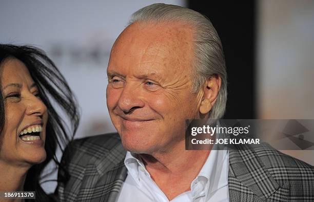 Actor Sir Anthony Hopkins with family arrive at the premiere of Marvel's 'Thor: The Dark World' at the El Capitan Theatre on November 04, 2013 in...