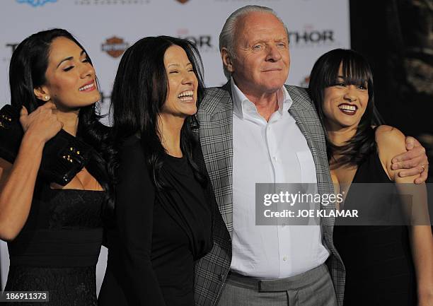 Actor Sir Anthony Hopkins with family arrive at the premiere of Marvel's 'Thor: The Dark World' at the El Capitan Theatre on November 04, 2013 in...