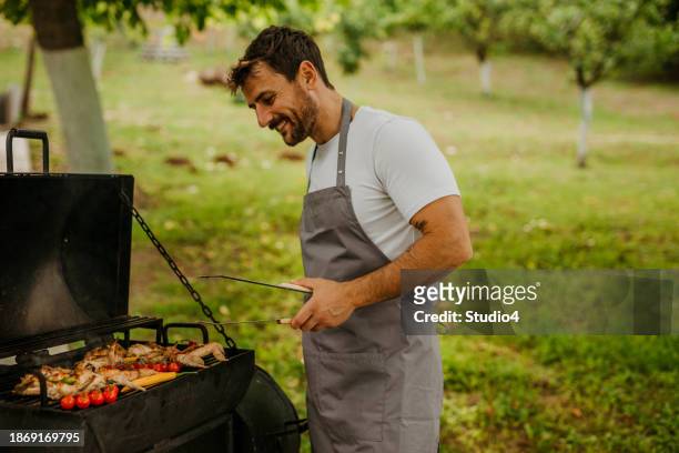 bbq time - smoking meat stock pictures, royalty-free photos & images