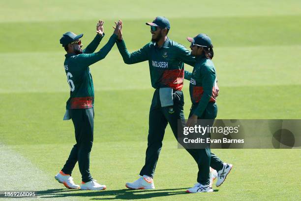 Bangladesh players celebrate a wicket during game two of the Men's ODI series between New Zealand and Bangladesh at Saxton Field on December 20, 2023...