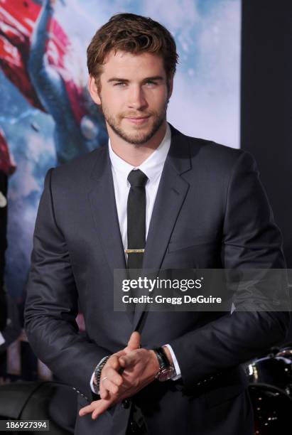 Actor Liam Hemsworth arrives at the Los Angeles premiere of "Thor: The Dark World" at the El Capitan Theatre on November 4, 2013 in Hollywood,...