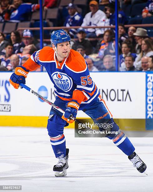 Ben Eager of the Edmonton Oilers skates against the Toronto Maple Leafs during an NHL game on October 2013 at Rexall Place in Edmonton, AB, Canada.