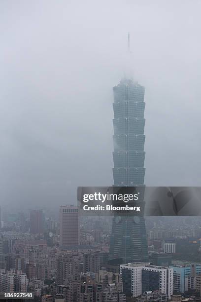 The Taipei 101 building stands among residential and commercial buildings in Taipei, Taiwan, on Monday, Nov. 4, 2013. Taiwans five-year bonds gained...