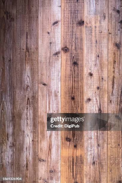 warmth of reclaimed elegance: a full frame of recycled wood wall - reclaimed stock pictures, royalty-free photos & images