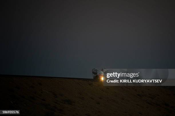 The Soyuz-FG launch vehicle with Soyuz TMA-11M spacecraft of the International Space Station Expedition 39 aboard is transported to a launch pad in...